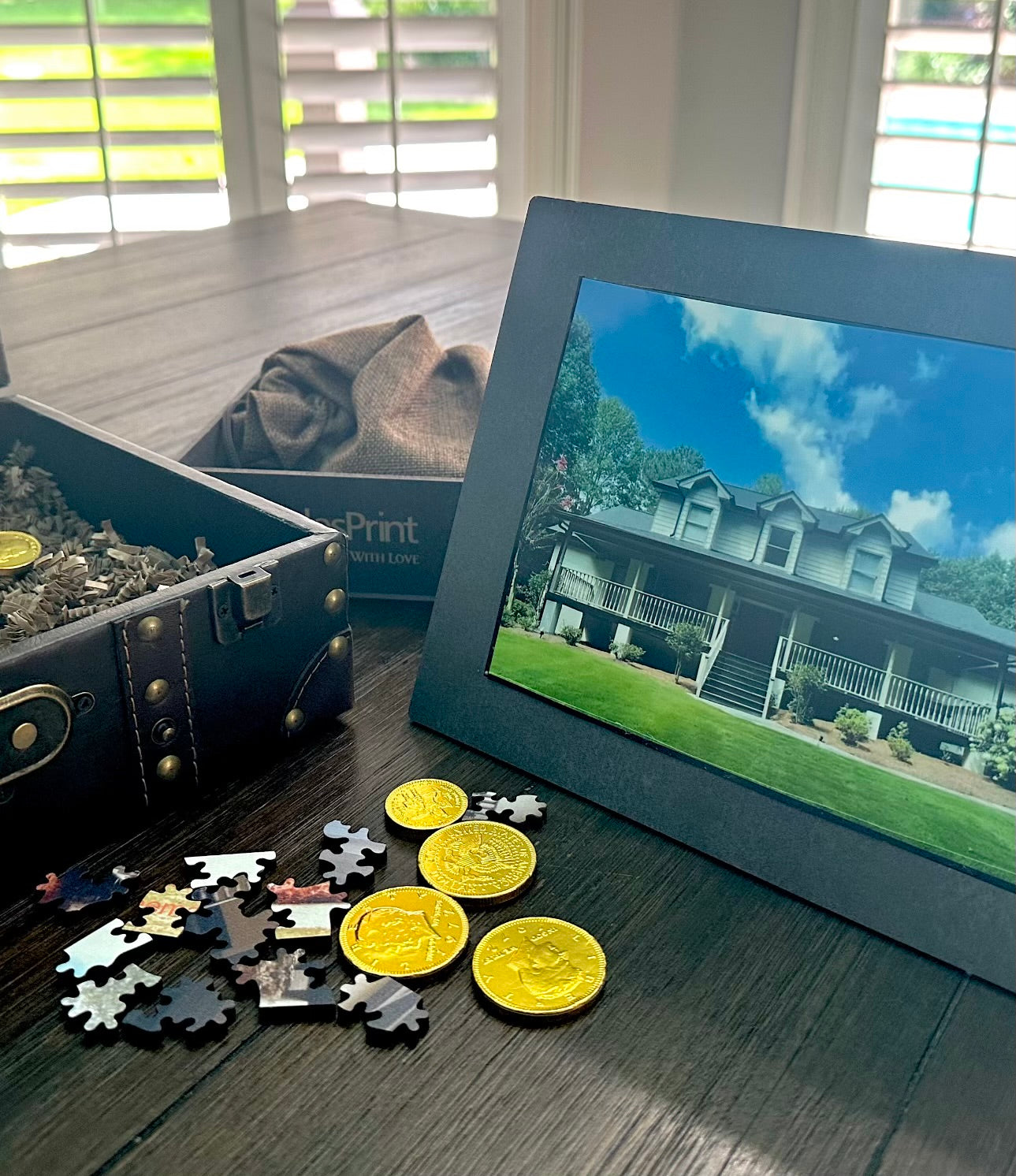 Personalized Puzzle in wooden trunk with gold chocolate coins.